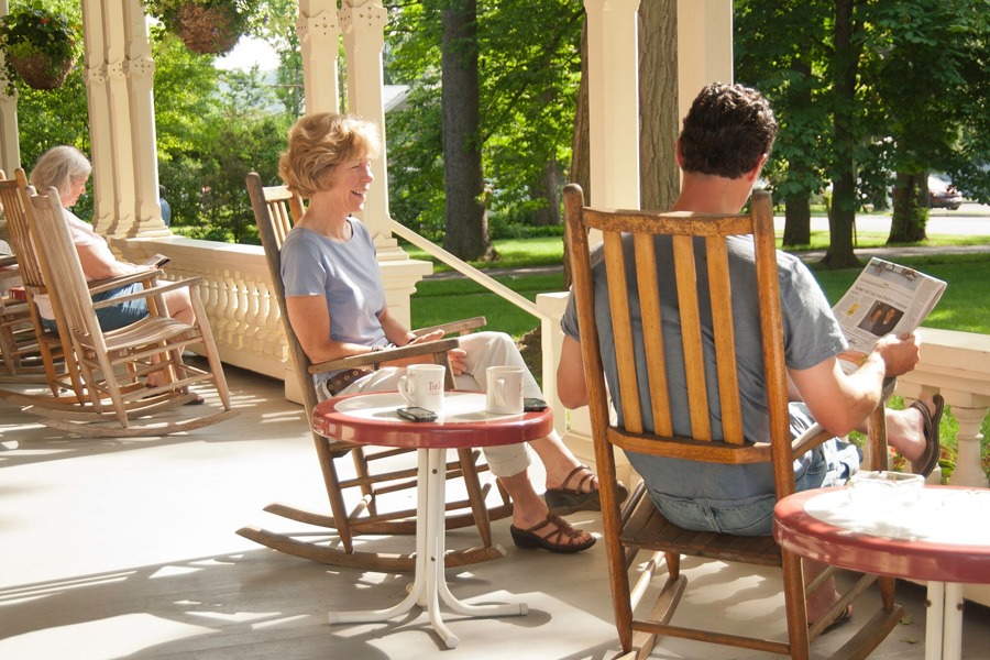 Guests on porch at Inn Cooperstown